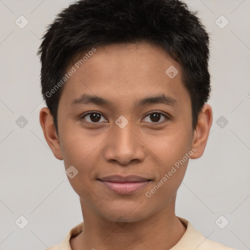 Joyful asian young-adult male with short  brown hair and brown eyes