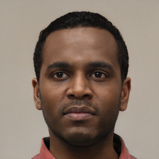 Neutral black young-adult male with short  black hair and brown eyes