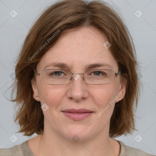 Joyful white adult female with medium  brown hair and blue eyes