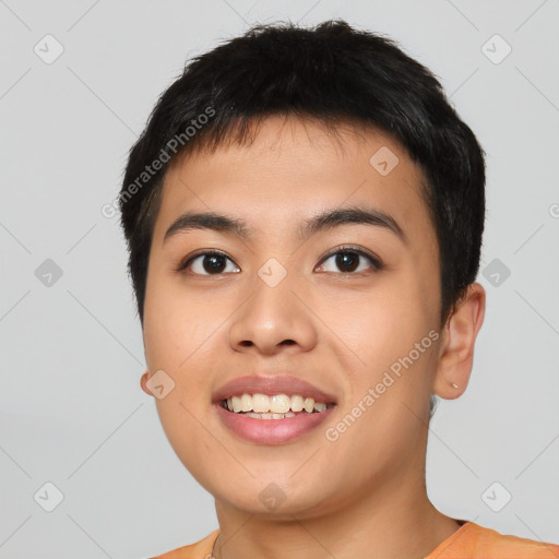 Joyful asian young-adult male with short  black hair and brown eyes