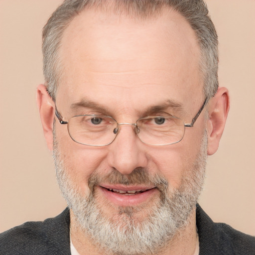 Joyful white middle-aged male with short  gray hair and grey eyes