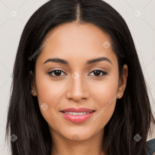 Joyful latino young-adult female with long  black hair and brown eyes