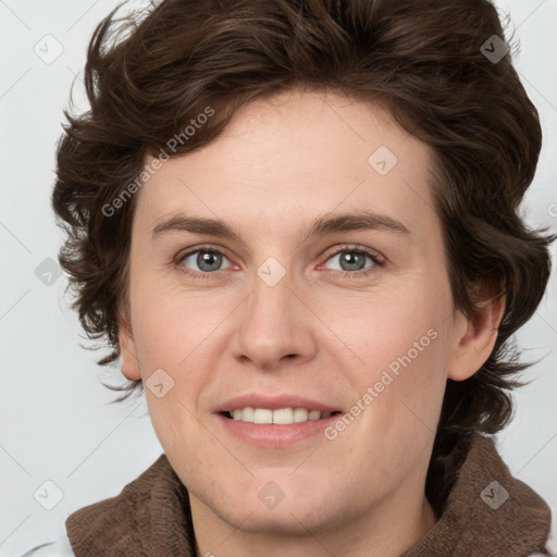 Joyful white young-adult female with medium  brown hair and green eyes