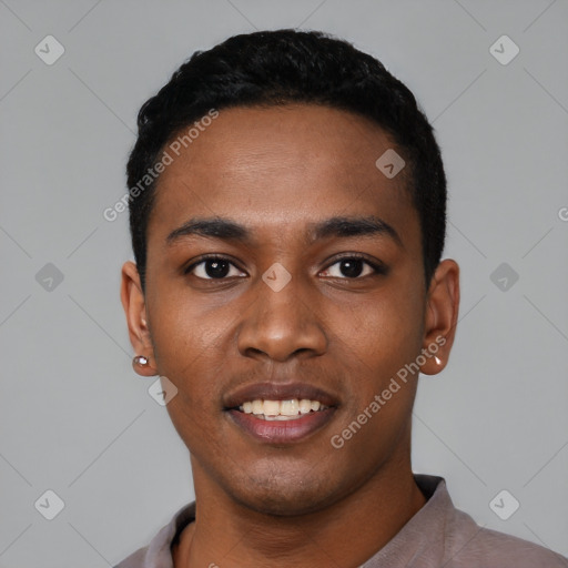 Joyful black young-adult male with short  black hair and brown eyes