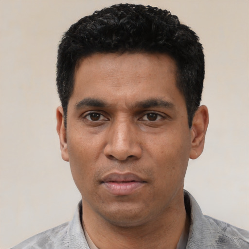 Neutral asian adult male with short  black hair and brown eyes