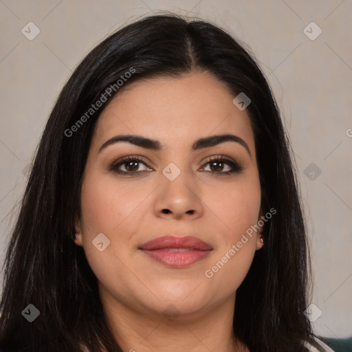 Joyful latino young-adult female with long  brown hair and brown eyes