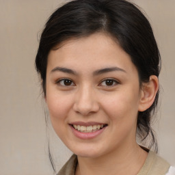 Joyful white young-adult female with medium  brown hair and brown eyes