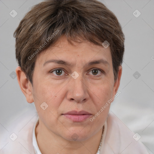 Joyful white adult female with short  brown hair and brown eyes