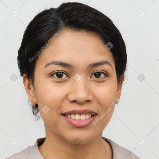 Joyful asian young-adult female with short  brown hair and brown eyes