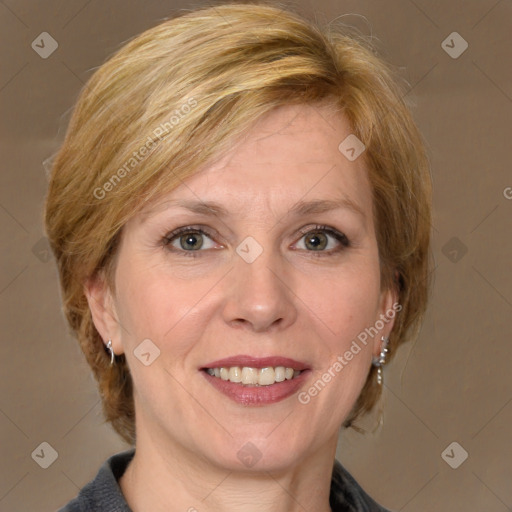 Joyful white adult female with medium  brown hair and grey eyes