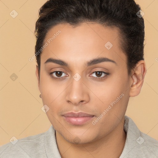 Joyful latino young-adult female with short  brown hair and brown eyes