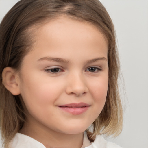 Joyful white child female with medium  brown hair and brown eyes