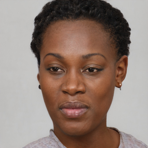 Neutral black young-adult female with short  black hair and brown eyes