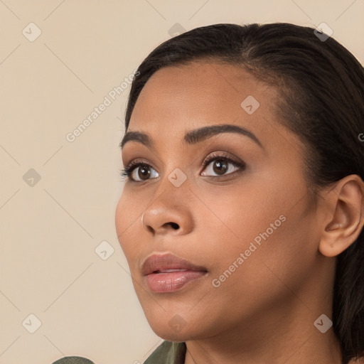 Neutral latino young-adult female with long  brown hair and brown eyes