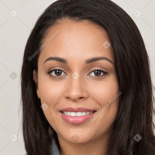 Joyful white young-adult female with long  black hair and brown eyes