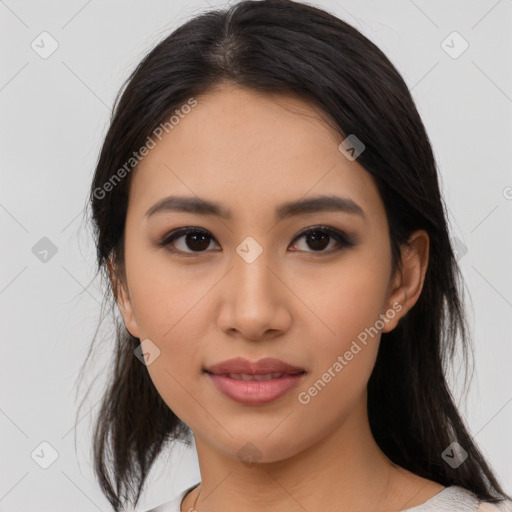 Joyful asian young-adult female with medium  black hair and brown eyes