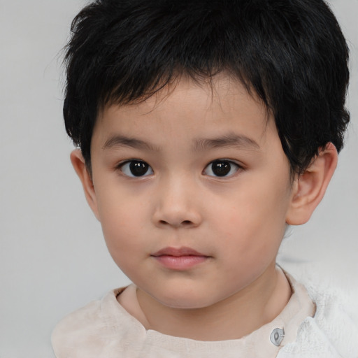 Neutral asian child male with short  brown hair and brown eyes