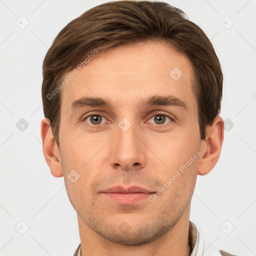 Neutral white young-adult male with short  brown hair and brown eyes