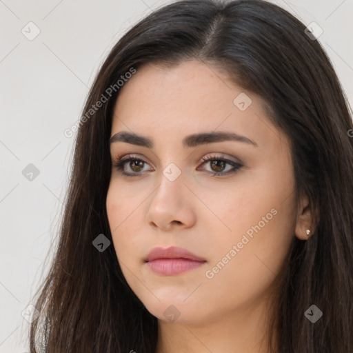 Neutral white young-adult female with long  brown hair and brown eyes