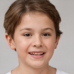 Joyful white child female with short  brown hair and brown eyes