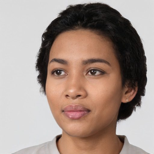 Neutral latino young-adult female with short  black hair and brown eyes