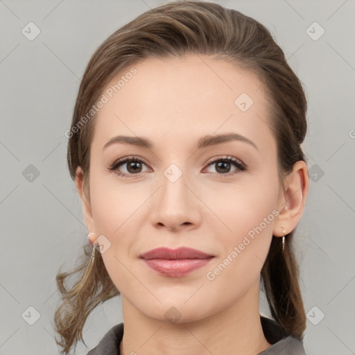 Joyful white young-adult female with medium  brown hair and grey eyes