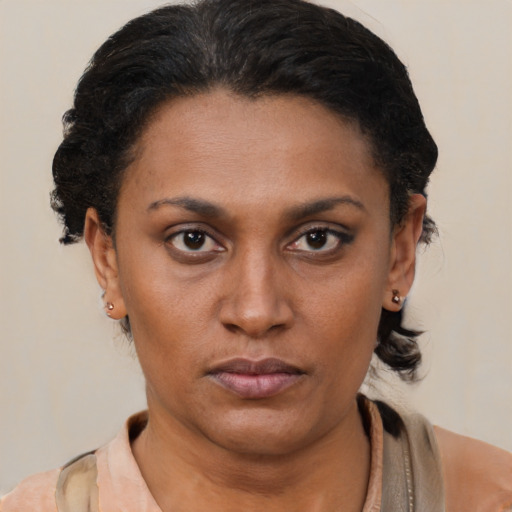Neutral latino young-adult female with short  brown hair and brown eyes