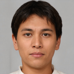 Neutral asian young-adult male with short  brown hair and brown eyes