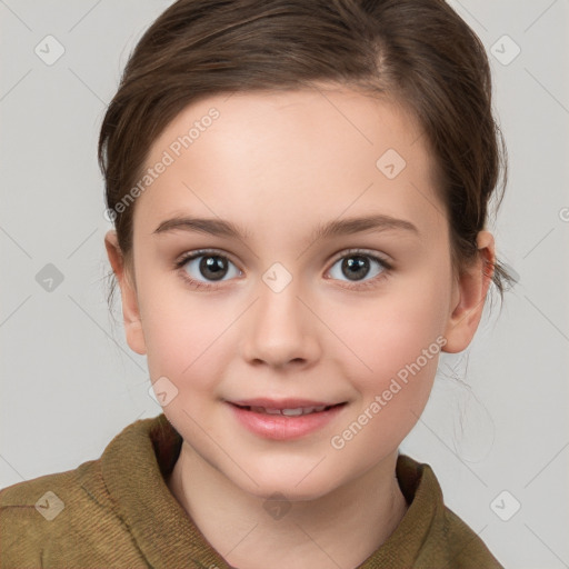 Joyful white child female with medium  brown hair and brown eyes