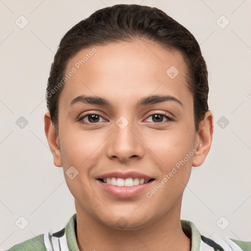 Joyful white young-adult female with short  brown hair and brown eyes