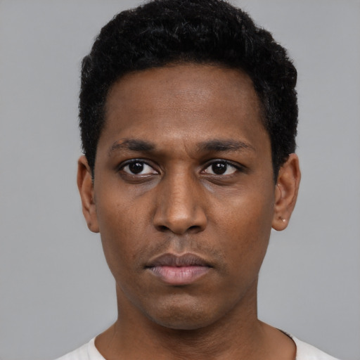 Neutral black young-adult male with short  black hair and brown eyes