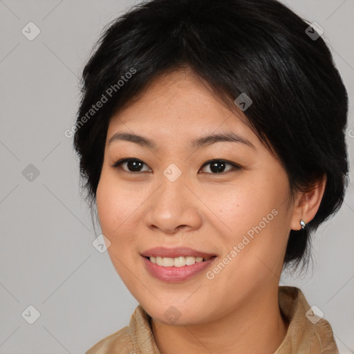 Joyful asian young-adult female with medium  brown hair and brown eyes