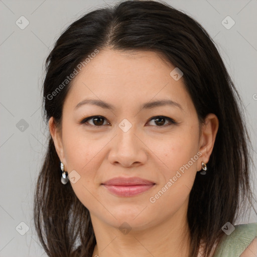 Joyful white adult female with medium  brown hair and brown eyes