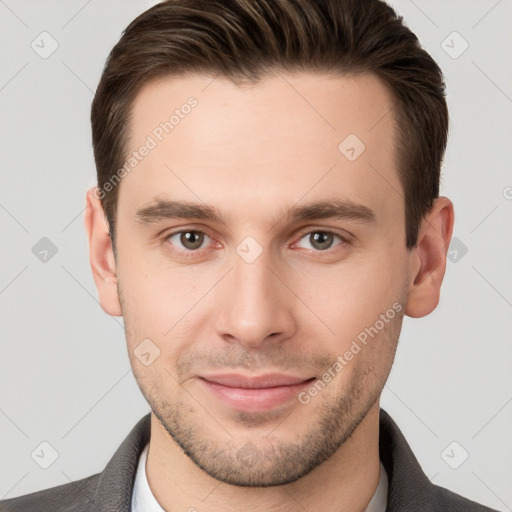 Joyful white young-adult male with short  brown hair and brown eyes