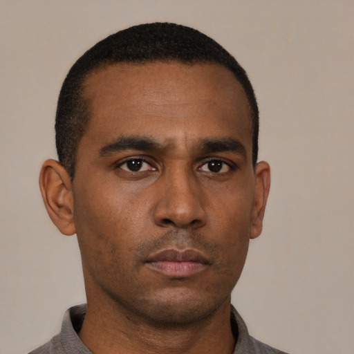 Neutral black young-adult male with short  black hair and brown eyes