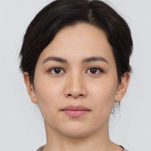 Neutral white young-adult female with medium  black hair and brown eyes