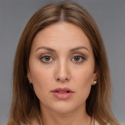 Neutral white young-adult female with medium  brown hair and brown eyes