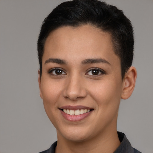 Joyful white young-adult female with short  brown hair and brown eyes