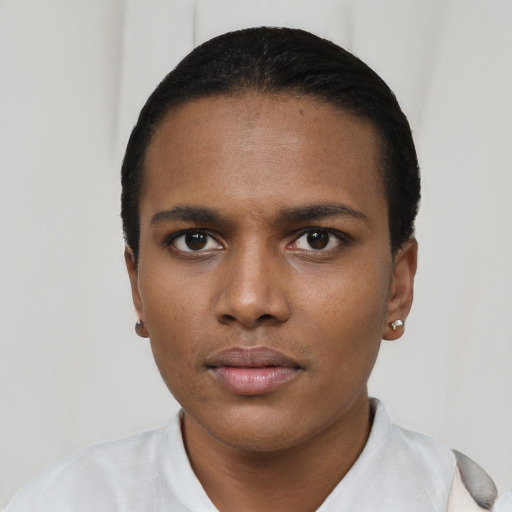 Neutral latino young-adult female with short  brown hair and brown eyes