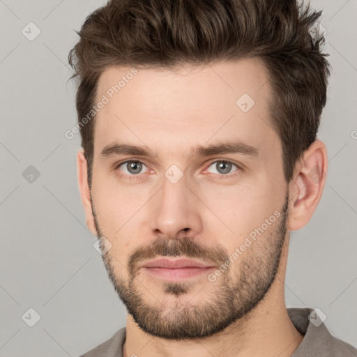 Neutral white young-adult male with short  brown hair and brown eyes