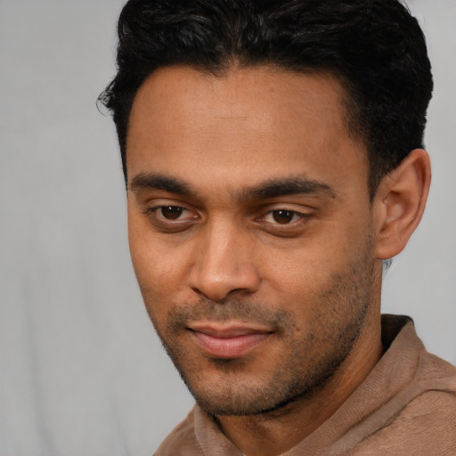 Neutral latino young-adult male with short  black hair and brown eyes