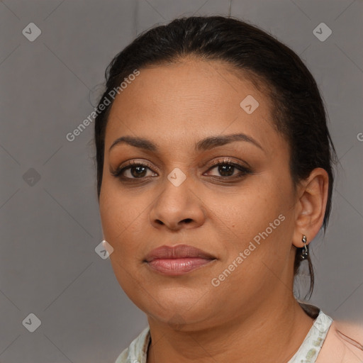 Joyful latino young-adult female with medium  brown hair and brown eyes