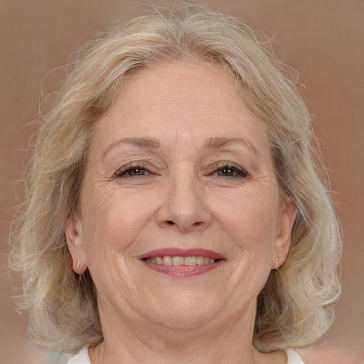 Joyful white middle-aged female with medium  brown hair and brown eyes