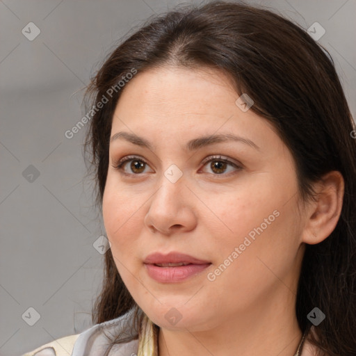 Joyful white adult female with medium  brown hair and brown eyes