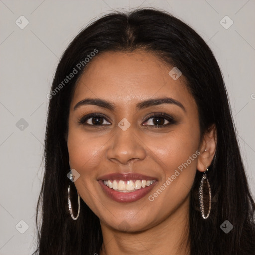 Joyful latino young-adult female with long  brown hair and brown eyes