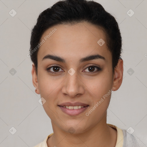 Joyful latino young-adult female with short  brown hair and brown eyes