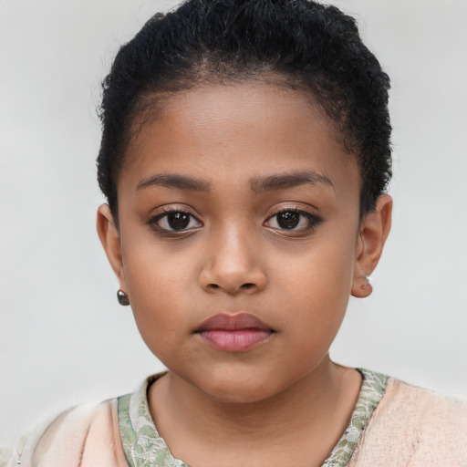 Neutral latino child female with short  brown hair and brown eyes