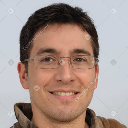 Joyful white adult male with short  brown hair and brown eyes