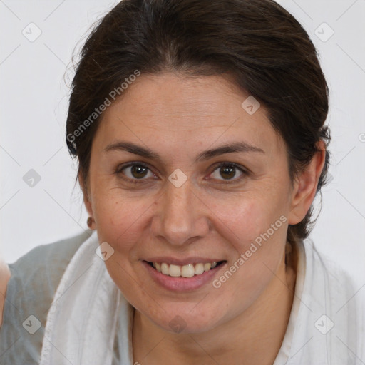 Joyful white adult female with short  brown hair and brown eyes