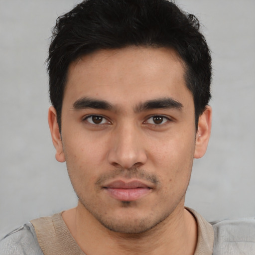 Neutral white young-adult male with short  black hair and brown eyes